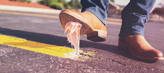 Man stepping in gum